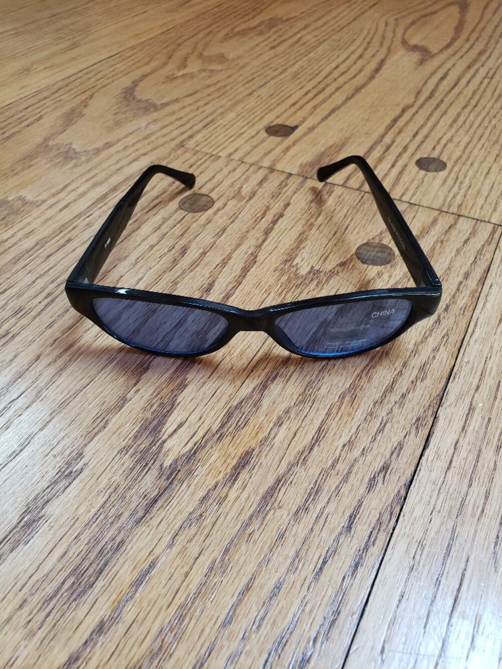 Vintage 90s Y2K Black Oval Sunglasses Blue Tinted Lens NOS